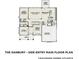 Detailed main floor plan of the home layout showcasing the kitchen, living spaces, and garage at 125 Leveret Rd, Locust Grove, GA 30248