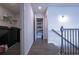 Hallway features a laundry room and a shelved pantry at 125 Leveret Rd, Locust Grove, GA 30248