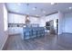 Spacious kitchen with modern appliances, large island with seating, and ample cabinet space at 125 Leveret Rd, Locust Grove, GA 30248