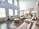 Open concept living room with two-story ceilings and access to the kitchen at 125 Leveret Rd, Locust Grove, GA 30248