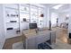 Bright office with built-in shelves and natural wood desk at 125 Leveret Rd, Locust Grove, GA 30248