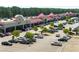 The retail shopping center boasts a diverse range of stores and a spacious parking lot for easy access at 125 Leveret Rd, Locust Grove, GA 30248