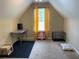 Unfurnished bonus room with neutral paint and carpet, ideal for storage or hobbies at 2257 Rocksram Ct, Buford, GA 30519