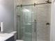 Modern bathroom boasting a stylish glass shower and elegant tile work at 2257 Rocksram Ct, Buford, GA 30519
