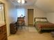 Upstairs bedroom featuring a bed, desk, and storage space at 2257 Rocksram Ct, Buford, GA 30519