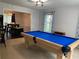 Game room view featuring a pool table, dining area, and ample space for entertainment at 2257 Rocksram Ct, Buford, GA 30519