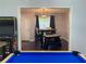 Game room featuring a pool table and view into the dining area at 2257 Rocksram Ct, Buford, GA 30519