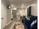 Open concept living space with stainless steel appliances, and comfortable seating at 2257 Rocksram Ct, Buford, GA 30519