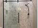 Modern bathroom shower showcasing white tile and contemporary fixtures at 2257 Rocksram Ct, Buford, GA 30519
