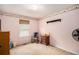 Cozy bedroom with a decorative wall border, rocking chair, and carpeted floor for a comfortable space at 4326 Megan Manor Sw Dr, Powder Springs, GA 30127
