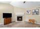 Close-up of a cozy fireplace, adding warmth and charm to the living space at 4326 Megan Manor Sw Dr, Powder Springs, GA 30127