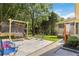 Spacious backyard with outdoor furniture, trampoline, and ample green space for recreation and relaxation at 5152 Clearwater Dr, Stone Mountain, GA 30087
