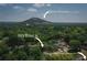 Aerial view of Stone Mountain surrounded by lush greenery, homes and labeled location of 1115 Third St at 1115 Third St, Stone Mountain, GA 30083
