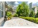 Stone patio and landscaping in a private backyard at 1115 Third St, Stone Mountain, GA 30083
