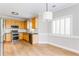 Bright kitchen featuring stainless steel appliances, and a window with plantation shutters at 1115 Third St, Stone Mountain, GA 30083