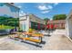 Exterior view of Outrun Brewing Company featuring picnic-style seating and a colorful mural in the background at 1115 Third St, Stone Mountain, GA 30083