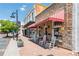 Welcome to downtown Stone Mountain Village with rocking chairs outside of the ice cream shop at 1115 Third St, Stone Mountain, GA 30083