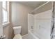 Bathroom with a shower and tub combination with a paisley patterned shower curtain and a window with natural light at 115 Eagle Ridge Dr, Canton, GA 30114