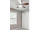 A cozy bedroom with neutral walls, double closet, and a window for natural light at 115 Eagle Ridge Dr, Canton, GA 30114