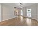 Bright dining room with hardwood floors, and large windows, offering ample natural light and views at 115 Eagle Ridge Dr, Canton, GA 30114