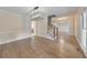 Hardwood floors, modern lighting, and neutral walls, create a bright and spacious dining area at 115 Eagle Ridge Dr, Canton, GA 30114