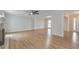 Open-concept living room featuring hardwood floors and fireplace, great for entertaining at 115 Eagle Ridge Dr, Canton, GA 30114