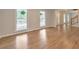 Living room featuring hardwood floors and large windows that provide plenty of natural light at 115 Eagle Ridge Dr, Canton, GA 30114
