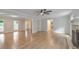 Open-concept living room featuring hardwood floors and fireplace, great for entertaining at 115 Eagle Ridge Dr, Canton, GA 30114