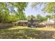 Expansive backyard featuring a patio, the rear of the home, and plenty of green space at 2991 Windfield Cir, Tucker, GA 30084