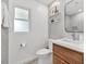 Cozy bathroom with wood vanity, updated sink, and updated fixtures at 2991 Windfield Cir, Tucker, GA 30084