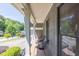 Charming front porch with cozy seating, offering a peaceful retreat with neighborhood views at 2991 Windfield Cir, Tucker, GA 30084