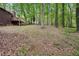 Large wooded backyard with mature trees offering privacy at 3679 Regent Nw Dr, Kennesaw, GA 30144