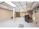 Expansive basement featuring recessed lighting and bar space, perfect for gatherings and relaxation at 3679 Regent Nw Dr, Kennesaw, GA 30144