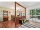 Inviting dining area featuring wood floors, deck access, and natural light at 3679 Regent Nw Dr, Kennesaw, GA 30144
