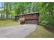 Charming split level home with an orange door and a two car garage at 3679 Regent Nw Dr, Kennesaw, GA 30144