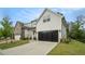 The two-car garage and driveway are great features of this beautiful home at 704 Fairlane Dr, Marietta, GA 30064