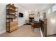 Cozy sitting area with wood floors, built-in shelves and cabinets, creating a relaxing and organized space at 704 Fairlane Dr, Marietta, GA 30064