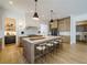 Open-concept kitchen features a large island with seating, modern appliances, and ample counter space at 777 Brookridge Ne Dr, Atlanta, GA 30306
