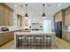 Spacious kitchen with a large island, modern lighting, and stainless steel appliances at 777 Brookridge Ne Dr, Atlanta, GA 30306