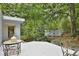 Comfortable back deck with outdoor seating and a glimpse of the inviting pool at 20 Mahan Ne Ln, Rydal, GA 30171