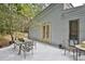 Outdoor seating on the back deck is perfect for enjoying the scenic views at 20 Mahan Ne Ln, Rydal, GA 30171