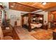 Spacious bedroom featuring a four-poster bed, tile floors and great natural light at 20 Mahan Ne Ln, Rydal, GA 30171
