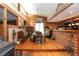Warm dining room featuring wood flooring, a dining set, and charming fixtures at 20 Mahan Ne Ln, Rydal, GA 30171