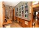 Hallway featuring display cabinets and views of the home's unique architectural features at 20 Mahan Ne Ln, Rydal, GA 30171