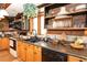 Functional kitchen featuring modern appliances, wooden cabinets, and a double sink at 20 Mahan Ne Ln, Rydal, GA 30171