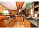 Well-equipped kitchen with wooden cabinets, tile floor, and plenty of counter space at 20 Mahan Ne Ln, Rydal, GA 30171