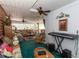 Spacious living room with carpeting and walls with large windows and a ceiling fan at 20 Mahan Ne Ln, Rydal, GA 30171