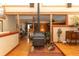 Unique living room with brick fireplace, hardwood floors, and rustic décor at 20 Mahan Ne Ln, Rydal, GA 30171