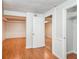 Finished basement space featuring laminate flooring and storage space at 2636 Suzanne Ln, Acworth, GA 30102