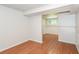 Spacious basement area featuring laminate flooring and bright white walls at 2636 Suzanne Ln, Acworth, GA 30102